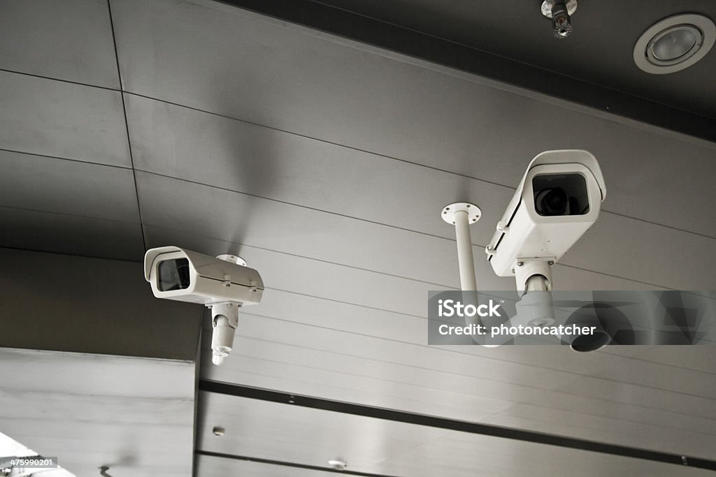 two security camera CCTV camera. Security camera on the ceiling. Private property protection. Home Ownership Stock Photo