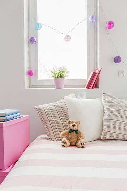 istock White and rose girl's room 475991538