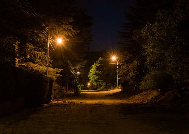 istock night photo of mountain road 475992062