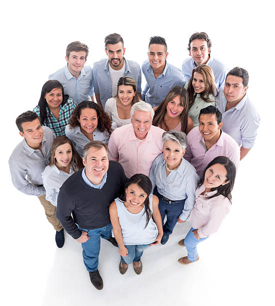 Large group of happy casual people looking at the camera and smiling