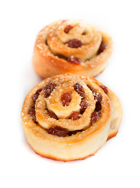istock Two swirl buns with raisins and brown sugar 475993173