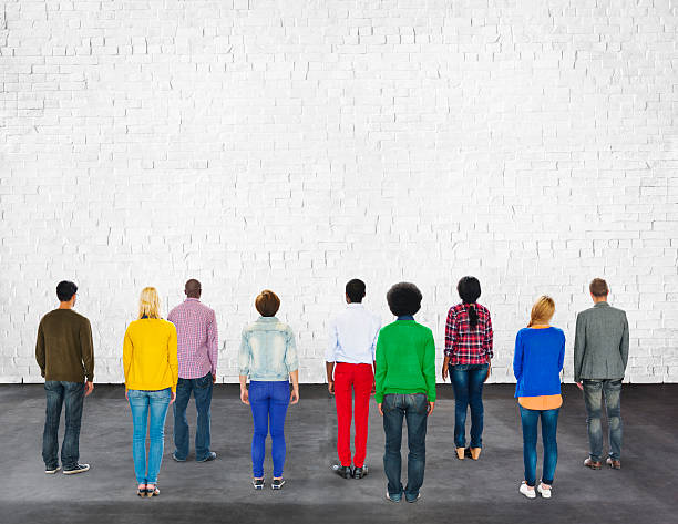 istock Group Of Multi-Ethnic People's Hands On Each Other's Shoulder An 475996346