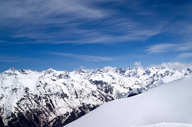 istock Off-piste slope and snowy mountains 475997296