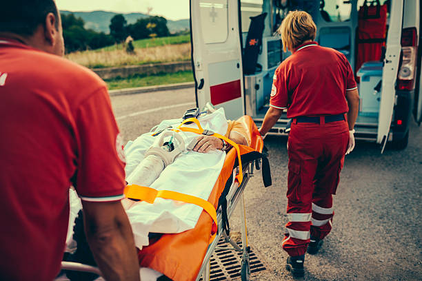 Rescue Team Providing First Aid stock photo