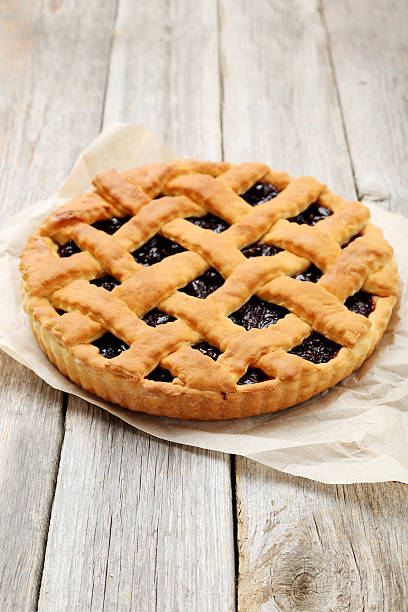 istock Homemade pie on grey wooden background 475997804