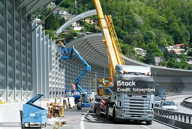 Workers During The Installation Of Noise Barriers On The Highway Stock Photo - Download Image Now