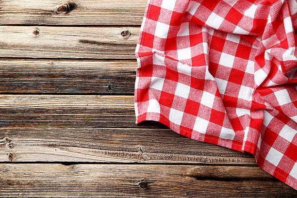 istock Napkin on brown wooden background 475998436