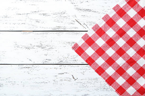 istock Napkin on white wooden background 475998440