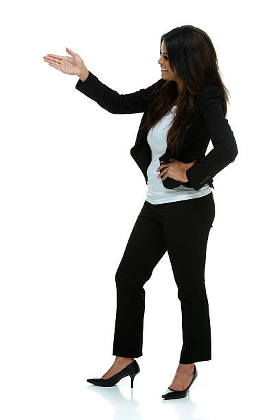 istock Smiling businesswoman presenting 475999120