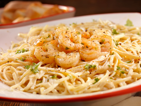 Sauteed Shrimp with Linguine in a Alfredo Sauce with Pepper and Fresh Parsley -Photographed on Hasselblad H3D2-39mb Camera