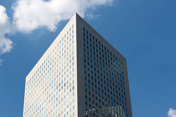 istock Skyscrapers from ground view with blue sky visible 476001266
