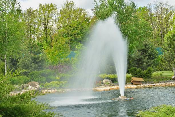 istock Fountain in the lake in the park 476001332