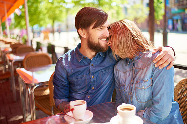 istock Couple relaxing at cafe 476004084