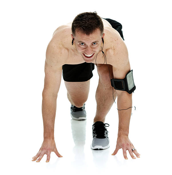 istock Male runner at starting line 476010540