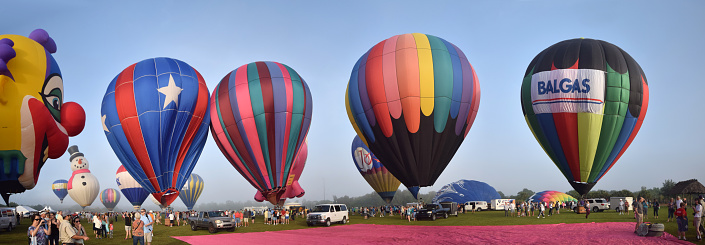 Immokalee, USA - April 11, 2015:  Colorful hot air balloons take flight on the morning of April 11, 2015 in Immokalee Florida. The town hosts an annual Balloons over Paradise festival