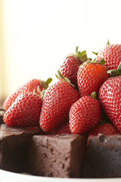 istock Strawberries on chocolate brownies 476010925