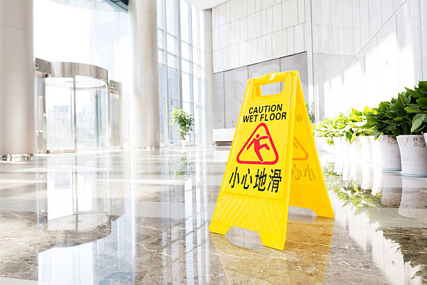 istock Sign showing warning of caution wet floor 476014951