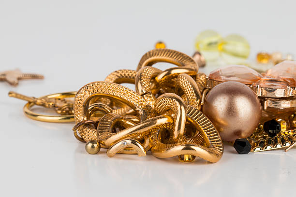 modern decoration - gold chains close-up, isolated on a white background