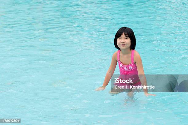 Little Asian Girl In Swimming Pool Stock Photo - Download Image Now - 2015, Activity, Asian and Indian Ethnicities