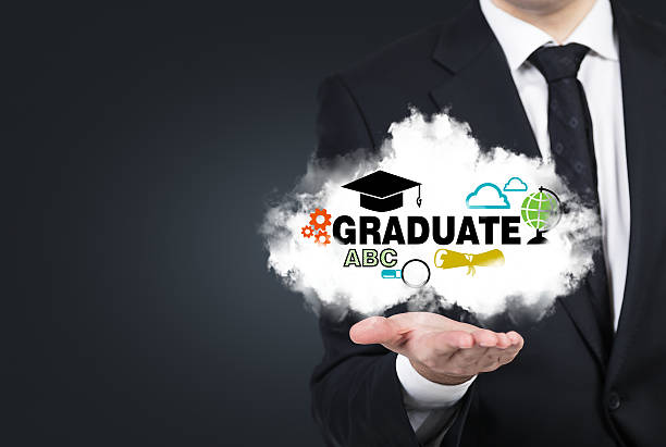 istock student's hand is holding a cloud with the educational icons. 476019520