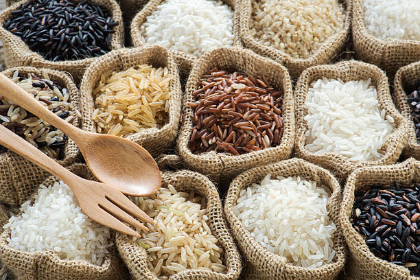 istock Group of organics rice in burlap bag 476021312