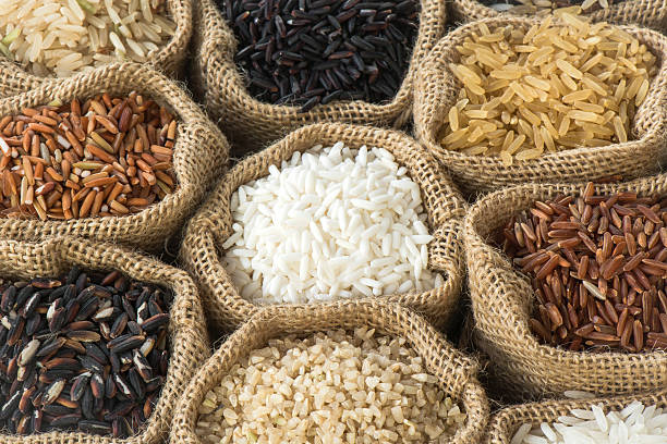istock Group of organics rice in burlap bag 476021314