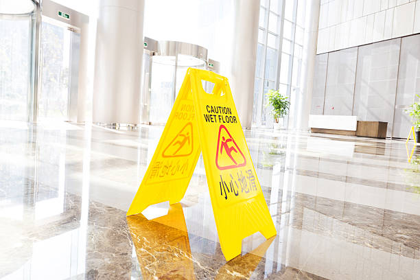 istock Sign showing warning of caution wet floor 476021439