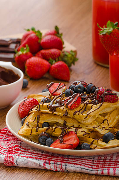 istock Belgian waffles with blueberries, strawberries 476022496