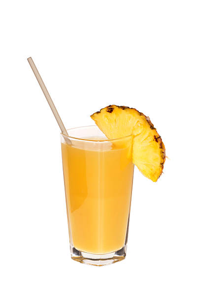 istock Glass of pineapple juice with drinking straw 476023995