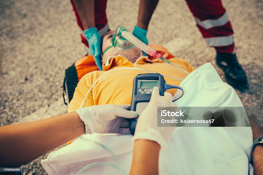 First Aid Rescue Images Rescue Team Providing First Aid Stock Photo - Download Image Now - 2015 ...