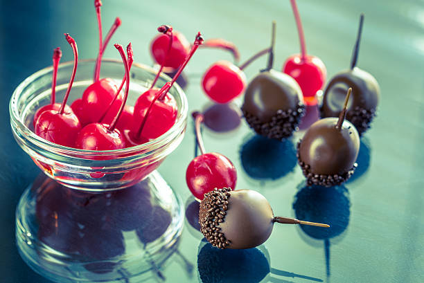 istock Chocolate and cocktail cherries on the glass 476026424