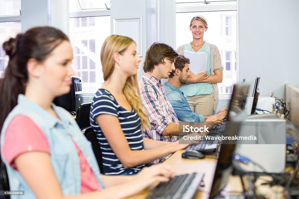 Student Tipe Computer Students In Computer Class Stock Photo - Download Image Now - 16-17 ...