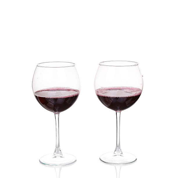 istock Two Wine Glasses with Red Wine on White Background 476031448