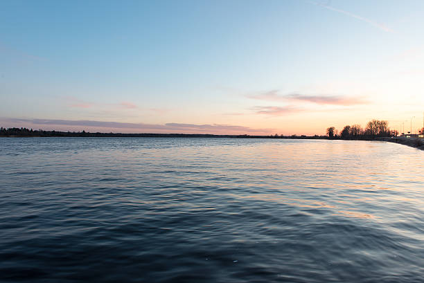 istock beautiful sunrise over the lake 476032676