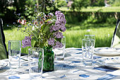 decorated garden table to eat outside in the early summer