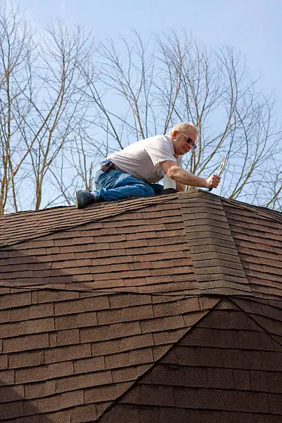 Roof inspector check for damage after recent wind storms, many roofs were damaged