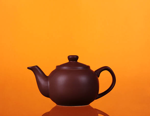 Classic chinese teapot of brown clay