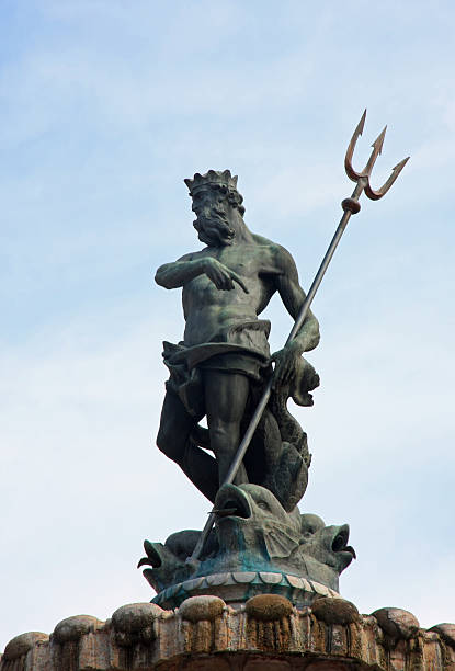 istock fountain with the statue of Neptune 476039275