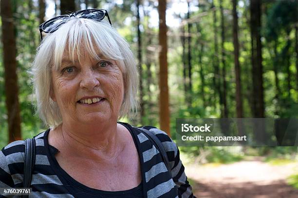 Happy Senior Woman Posing In Forest Stock Photo - Download Image Now - Active Seniors, Adult, Adults Only