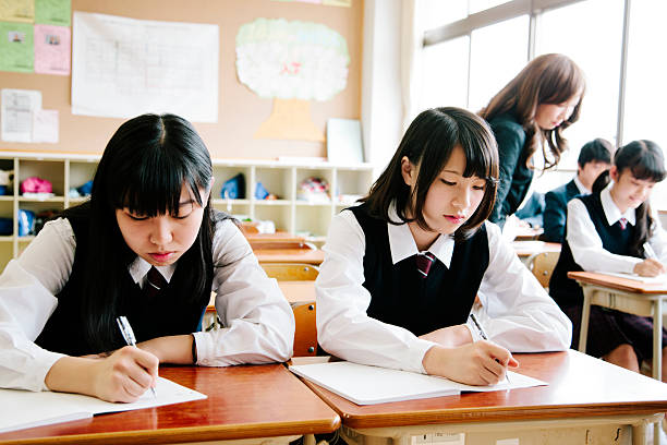 istock High school students studying in a classroom, teacher, Japan 476041038