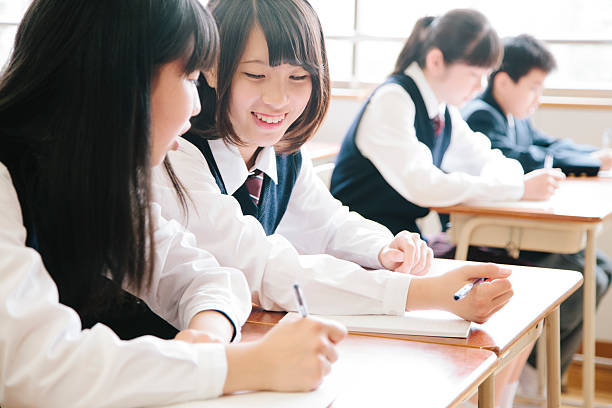 istock High school students, four teenagers working in a classroom, Japan 476041066