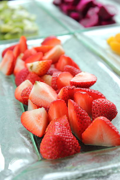 istock Close-up of fresh strawberry with slice 476043267