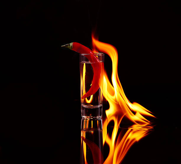 istock Hot chili pepper in a martini glass with 476044284