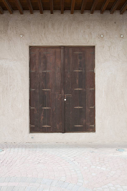 istock old wooden locked door 476046351