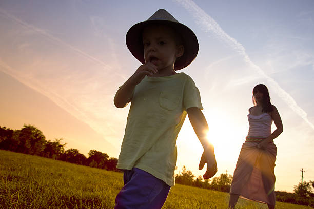 istock Mother and son playing in the park 476062269