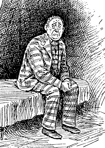 Prisoner in prison garb sits on a bed with befuddled expression. He wears stripped uniform. 
