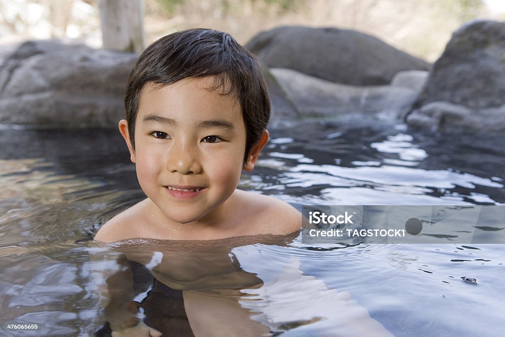 Boy in hot spring Hot Spring Stock Photo