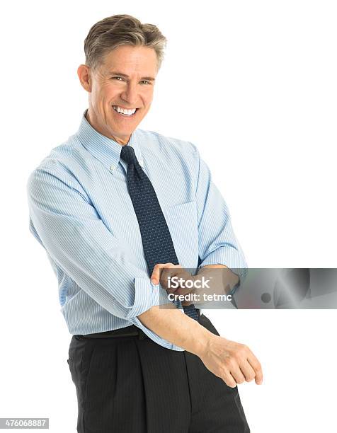 Happy Businessman Rolling Up His Sleeves Stock Photo - Download Image Now - Portrait, Rolling, Sleeve
