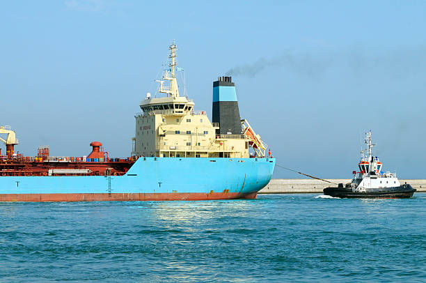 istock Tanker and Tugboat in the Harbor 476070631