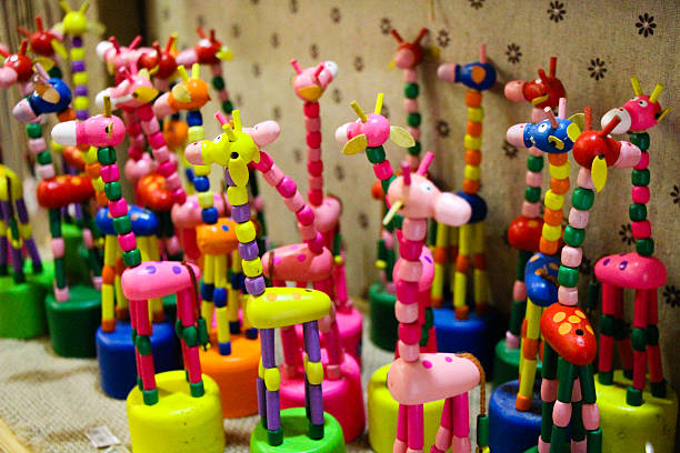 istock Giraffe-shaped pile of toys 476071147